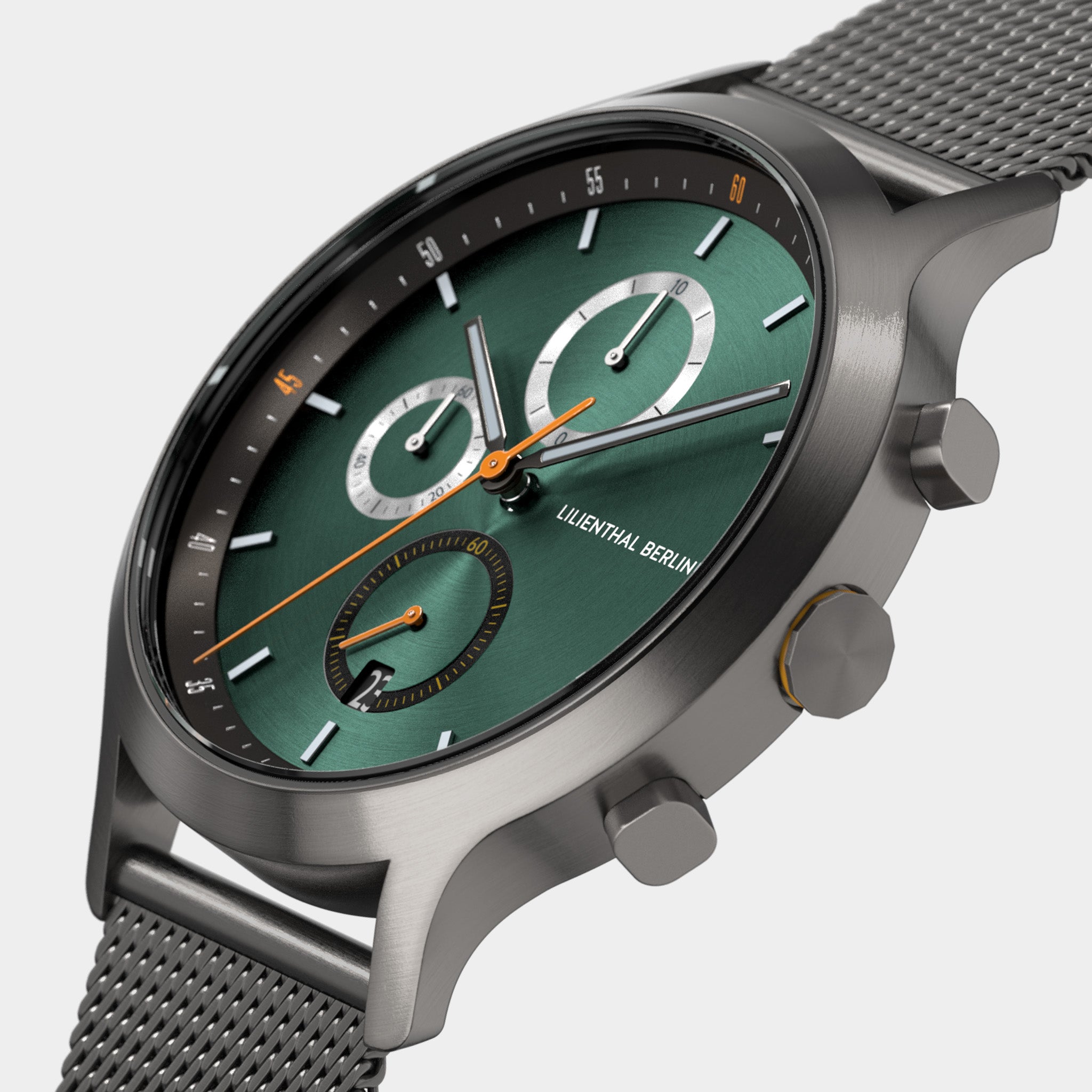 Stainless steel chronograph watch with green dial, mesh strap, and orange accents