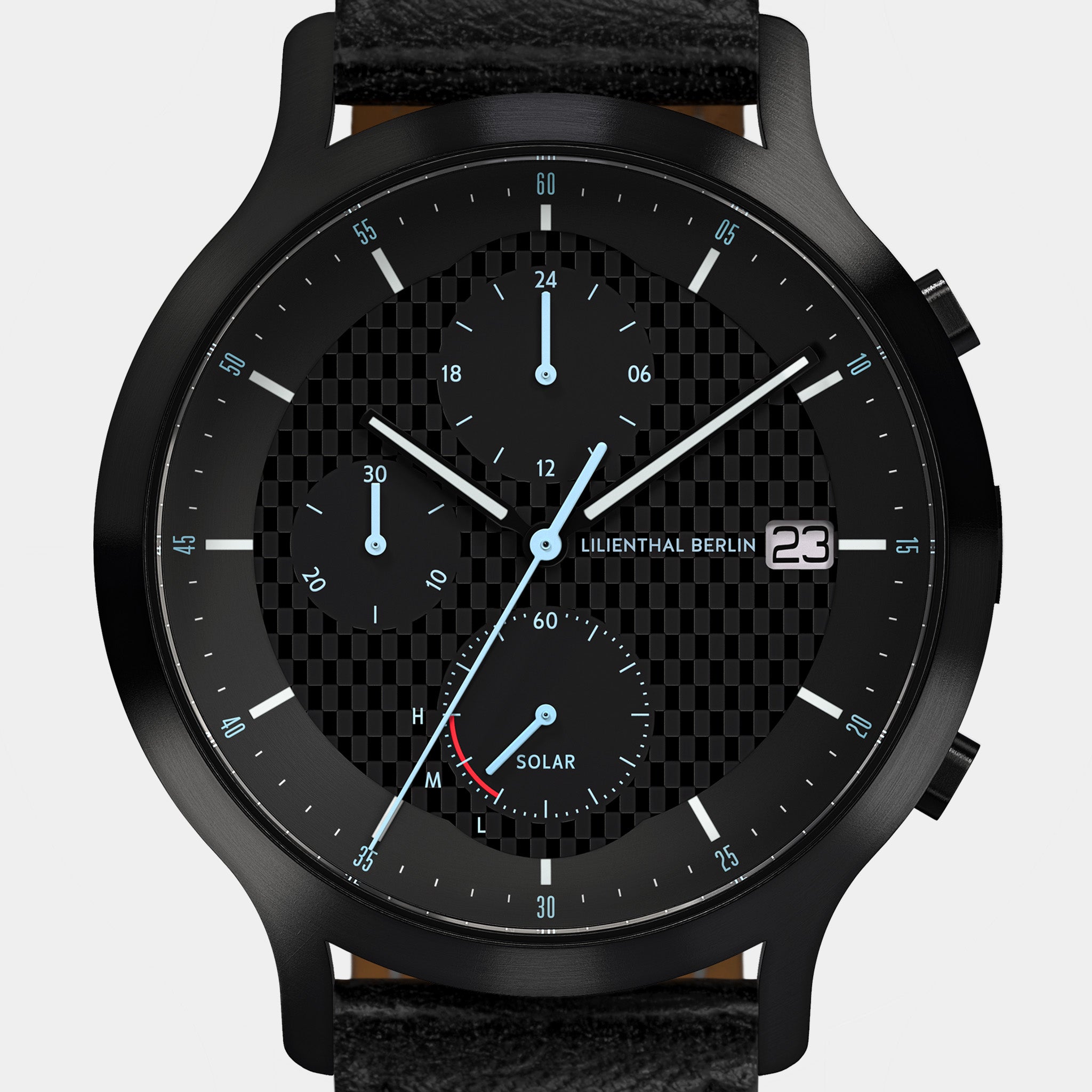 Black chronograph watch with solar subdial, textured checkered dial, and leather strap
