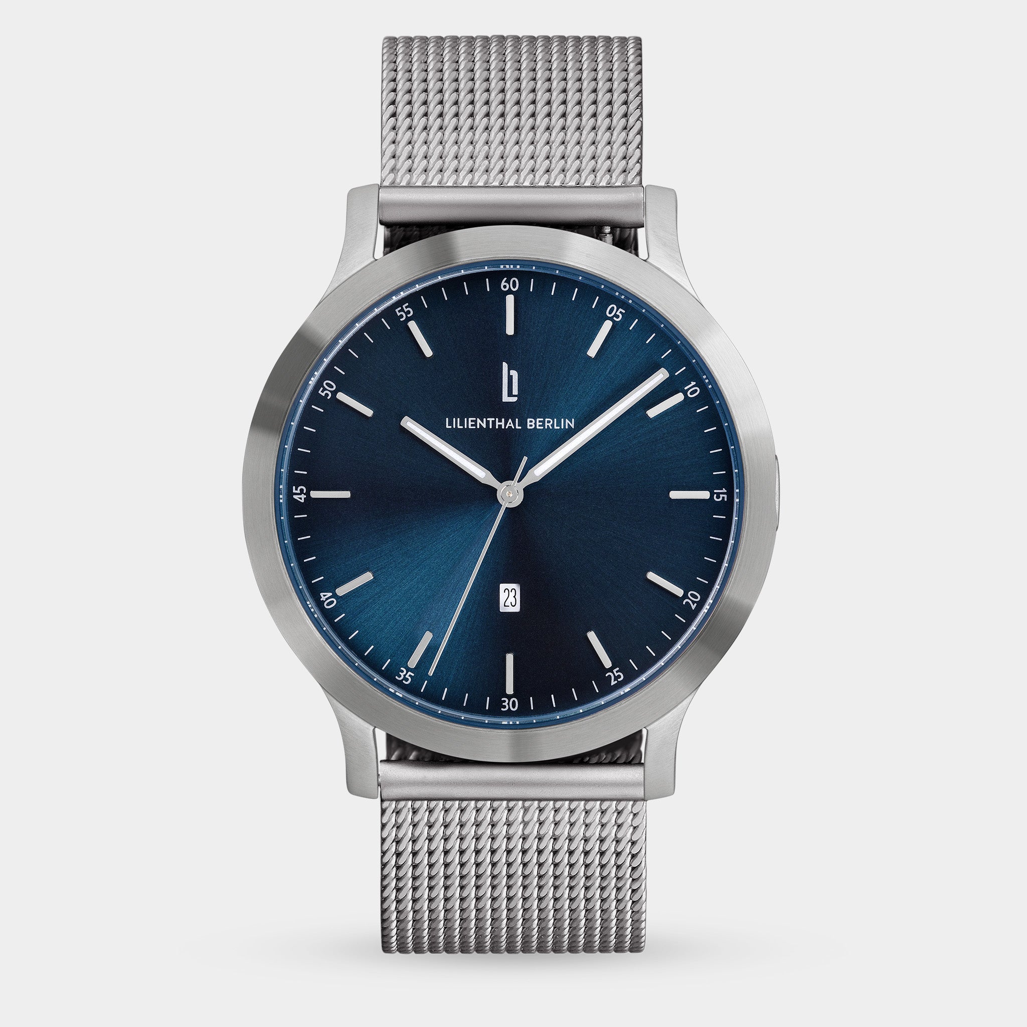 Silver mesh band watch with blue sunray dial and minimalist hour markers