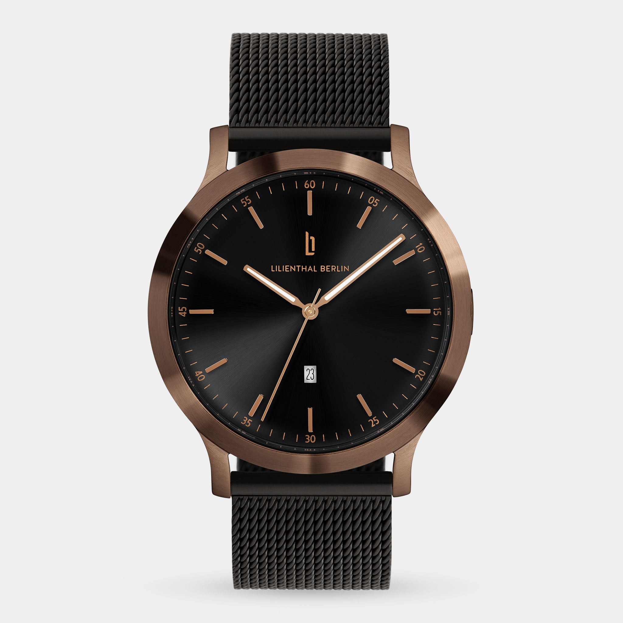 Black and rose gold minimalist wristwatch with mesh strap and date display