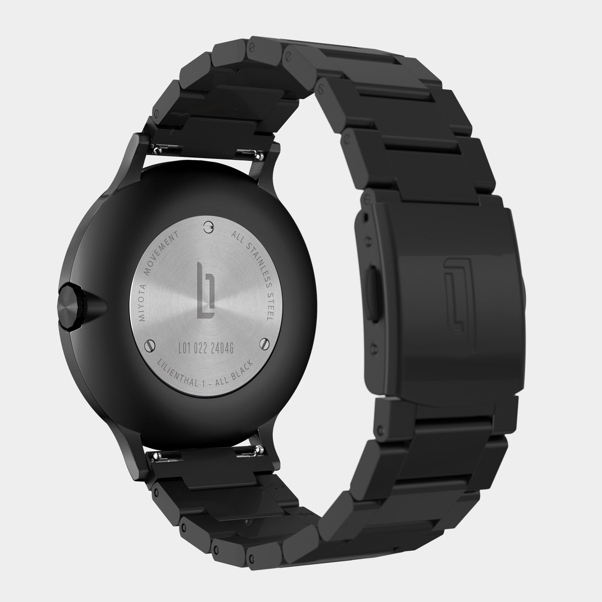 Black stainless steel men's watch with Miyota movement, engraved case back, and matte strap.