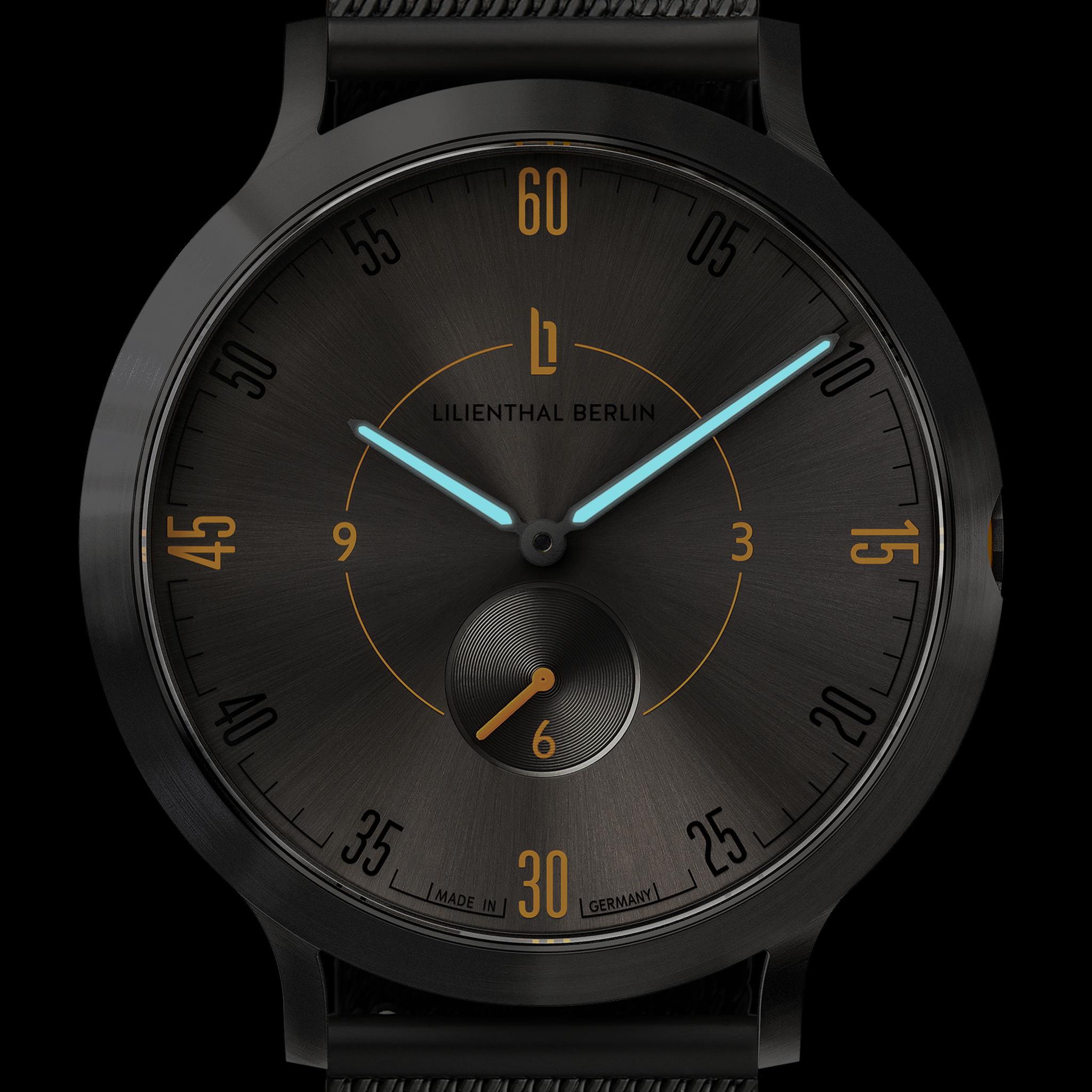 Black minimalist watch face with blue hands, gold numerals, and small seconds subdial