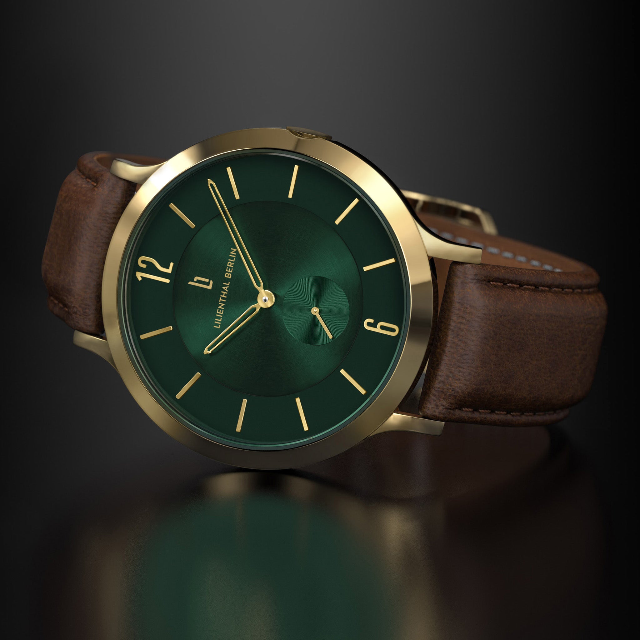 Elegant wristwatch with gold case, green dial, gold markers, and brown leather strap
