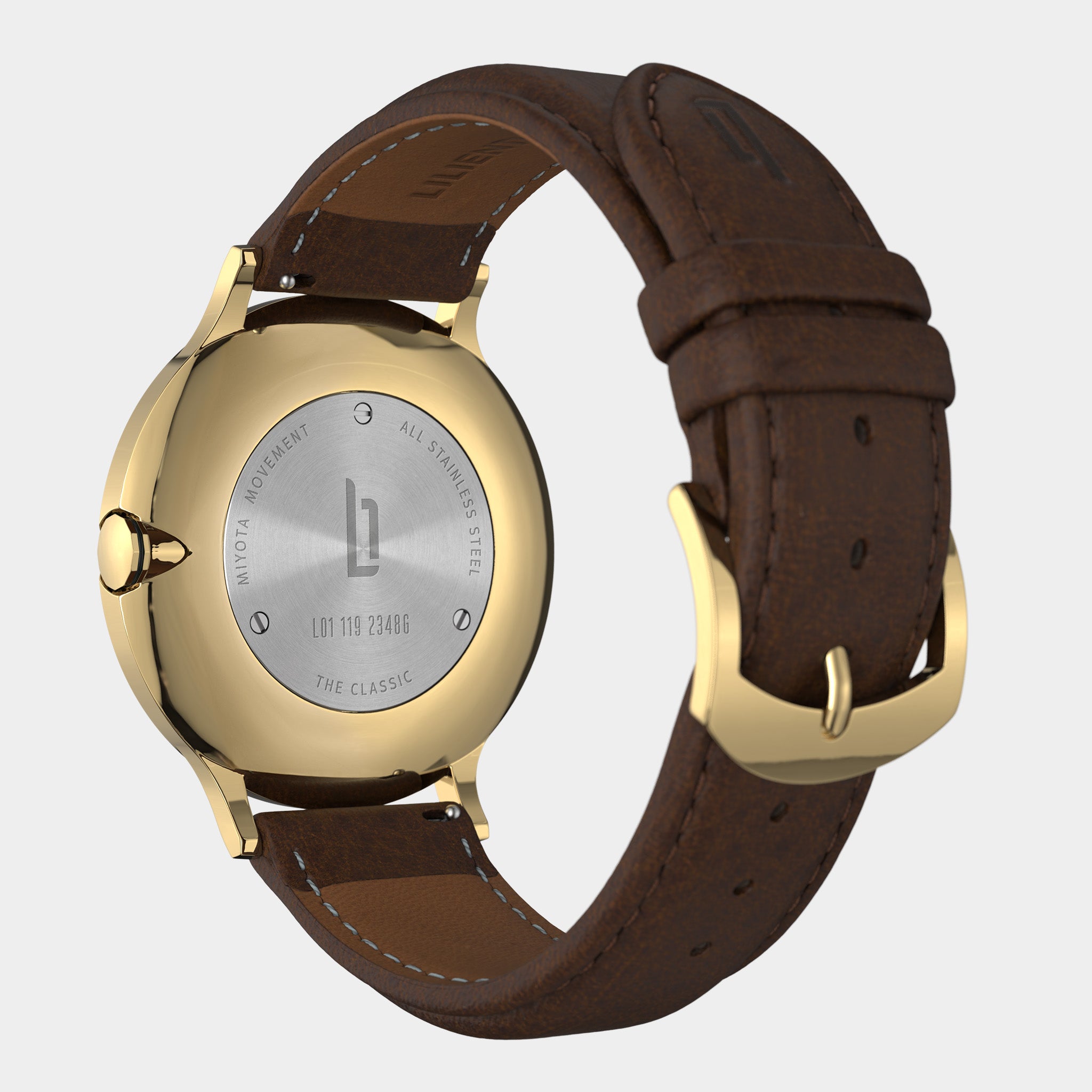 Gold-tone watch with engraved stainless steel back and brown leather strap