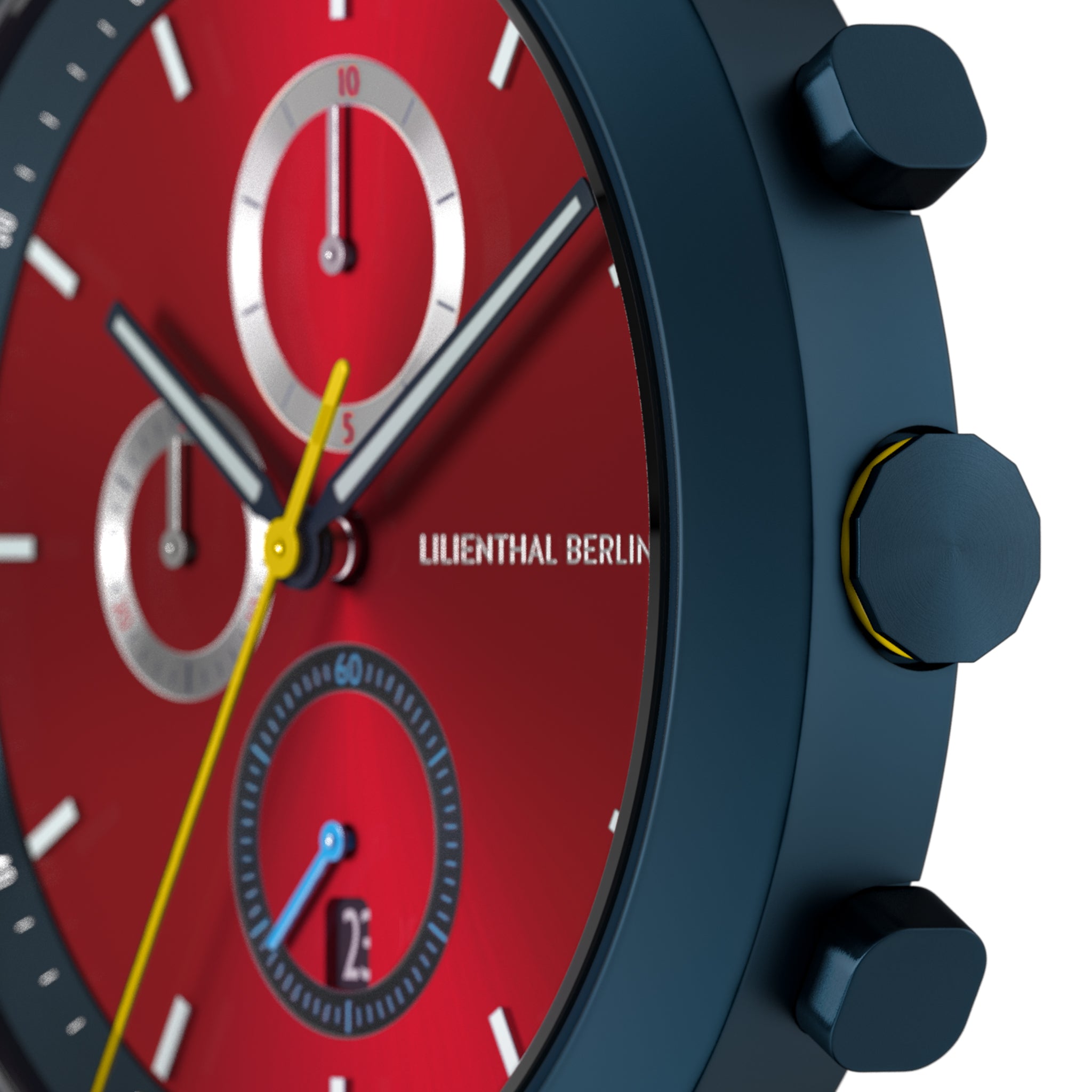 Close-up of modern chronograph watch face with red dial, subdials, and yellow second hand