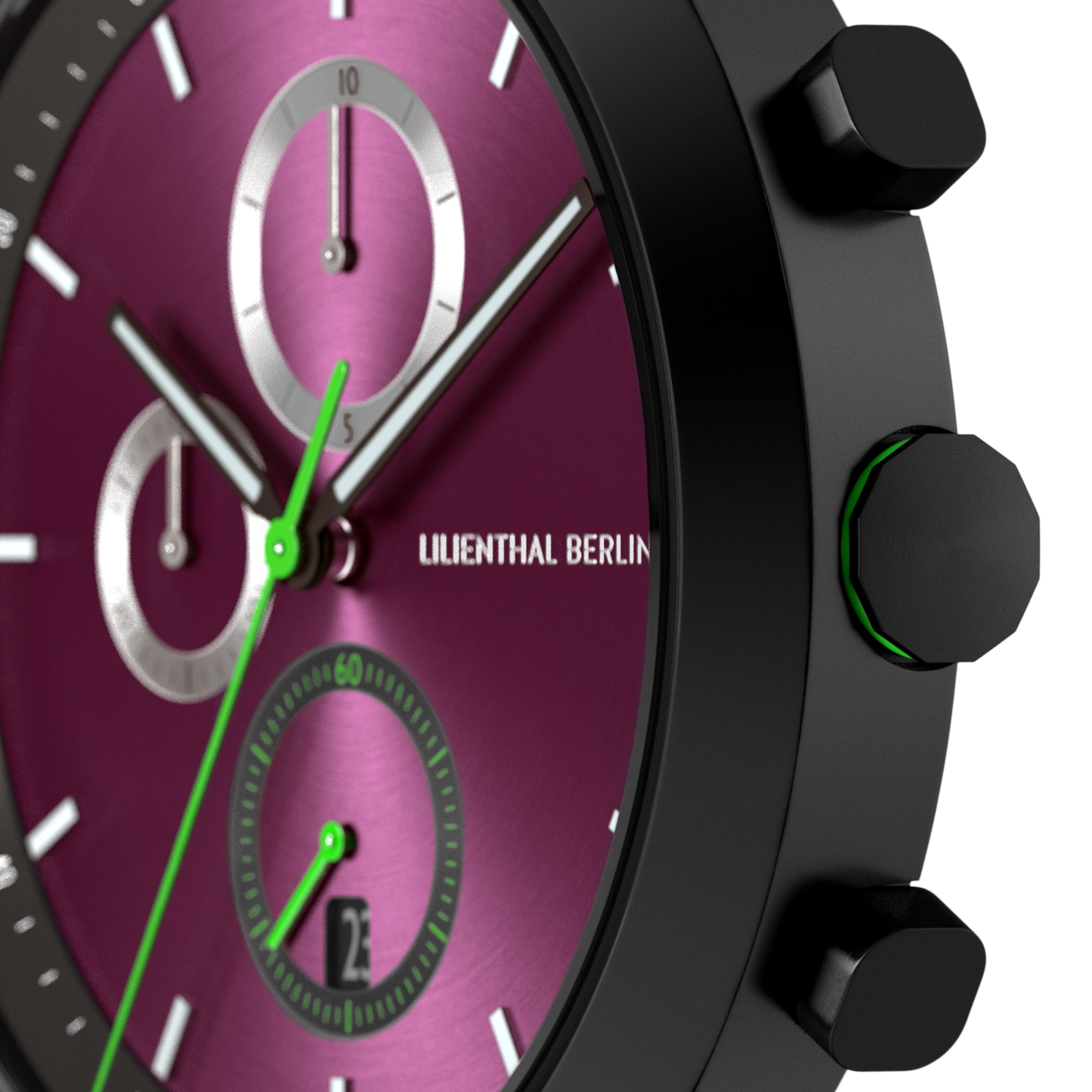 Close-up of a modern chronograph watch with a metallic magenta dial, black case, and green accents.