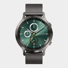 Men's chronograph watch with green dial, mesh strap, and subdials on white background