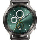 Men’s chronograph watch with green dial, subdials, mesh strap, date display, and silver case