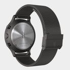 Stainless steel chronograph watch with black mesh strap, engraved case back and side buttons