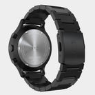 Back view of a black stainless steel chronograph watch with engraved case and metal bracelet