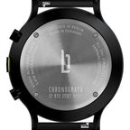 Stainless steel chronograph watch case back with engraved details and logo