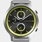 Modern chronograph watch with black dial, yellow accents, and stainless steel mesh band.
