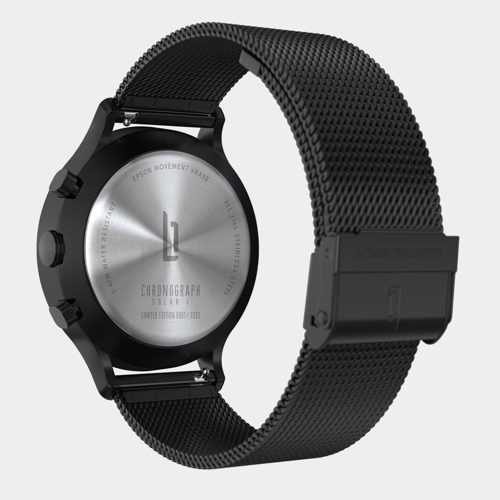 Back view of a stainless steel mesh band chronograph solar watch with black case