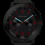 Black chronograph watch with red accents, luminous hands, and tachymeter scale