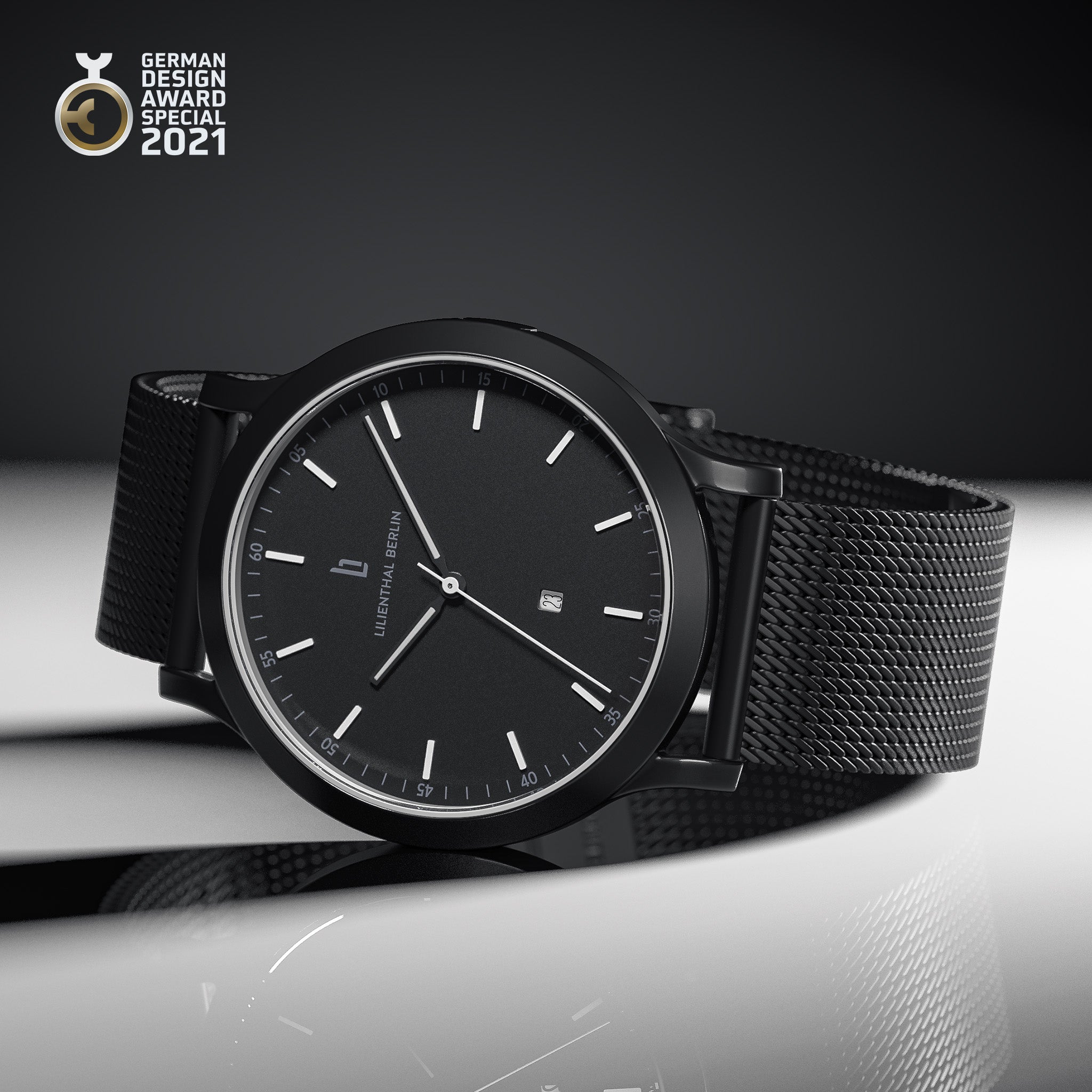 Minimalist black designer watch with mesh strap and date display, German Design Award 2021 winner