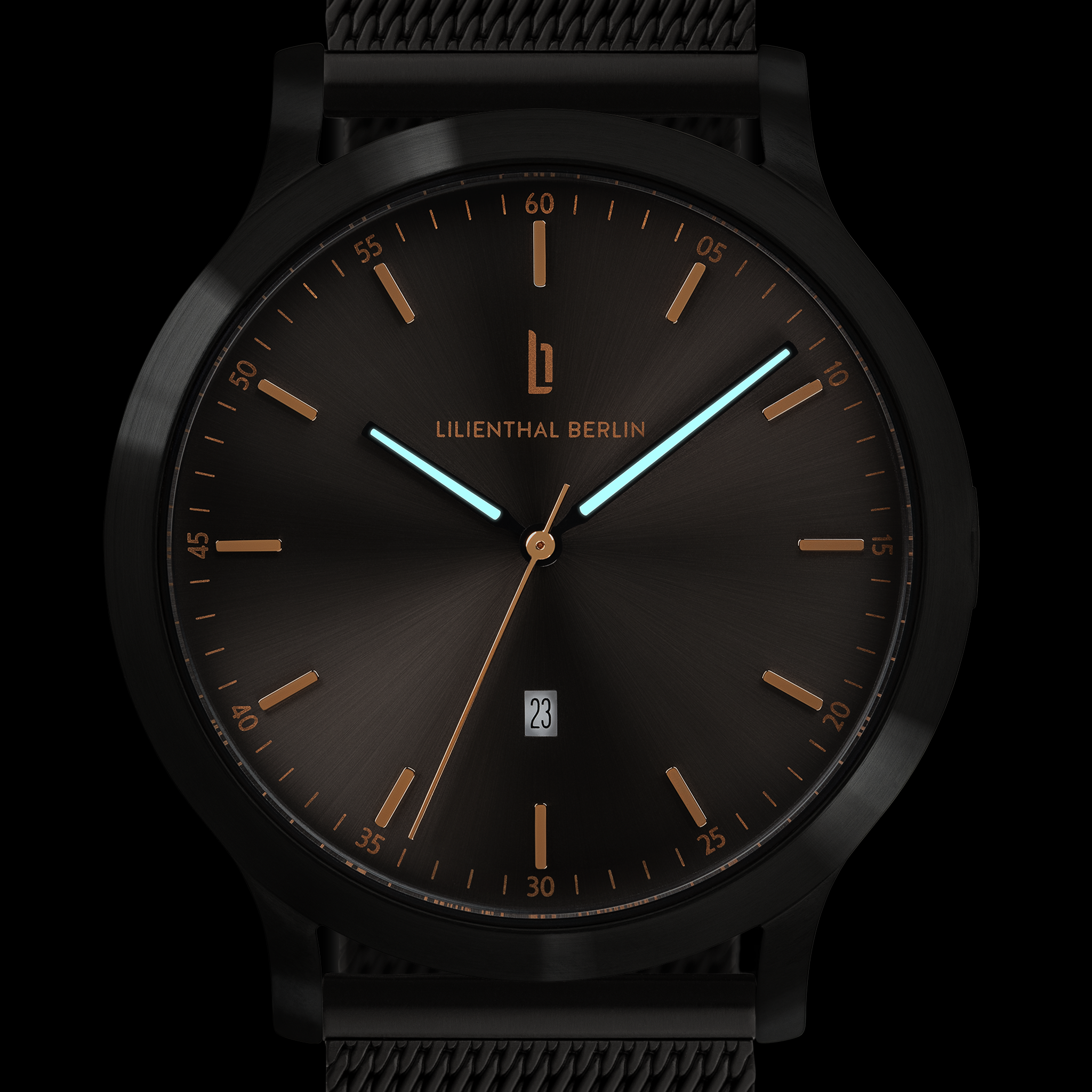 Minimalist black wristwatch with bronze indices, mesh strap, luminescent hands, and date display