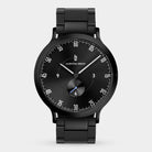 Sleek black stainless steel men's watch with minimalist dial and subdial on metal bracelet