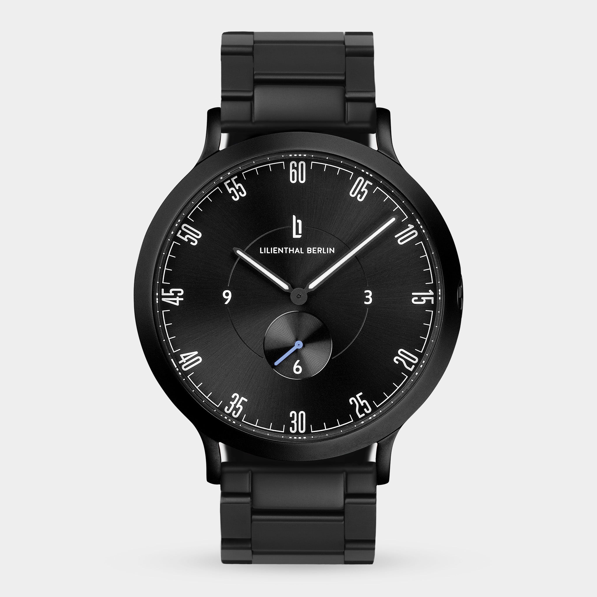 Sleek black stainless steel men's watch with minimalist dial and subdial on metal bracelet
