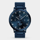 Sleek dark blue wristwatch with metal strap, minimalist dial, and small seconds subdial.