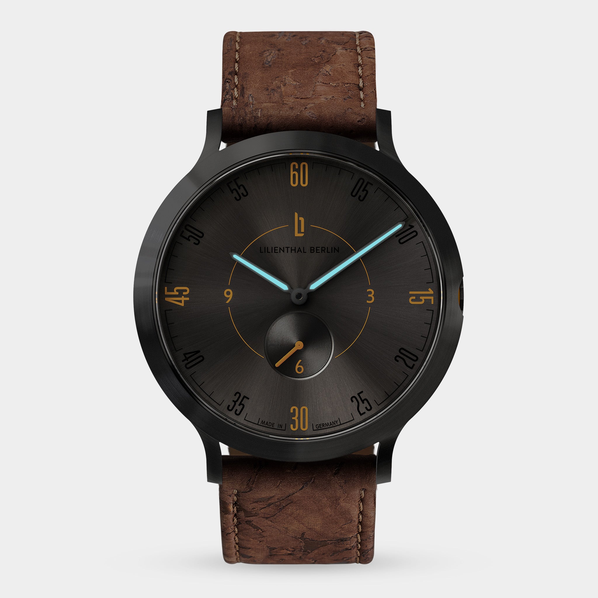 Men's black dial wristwatch with brown leather strap, minimalist design, blue hands.