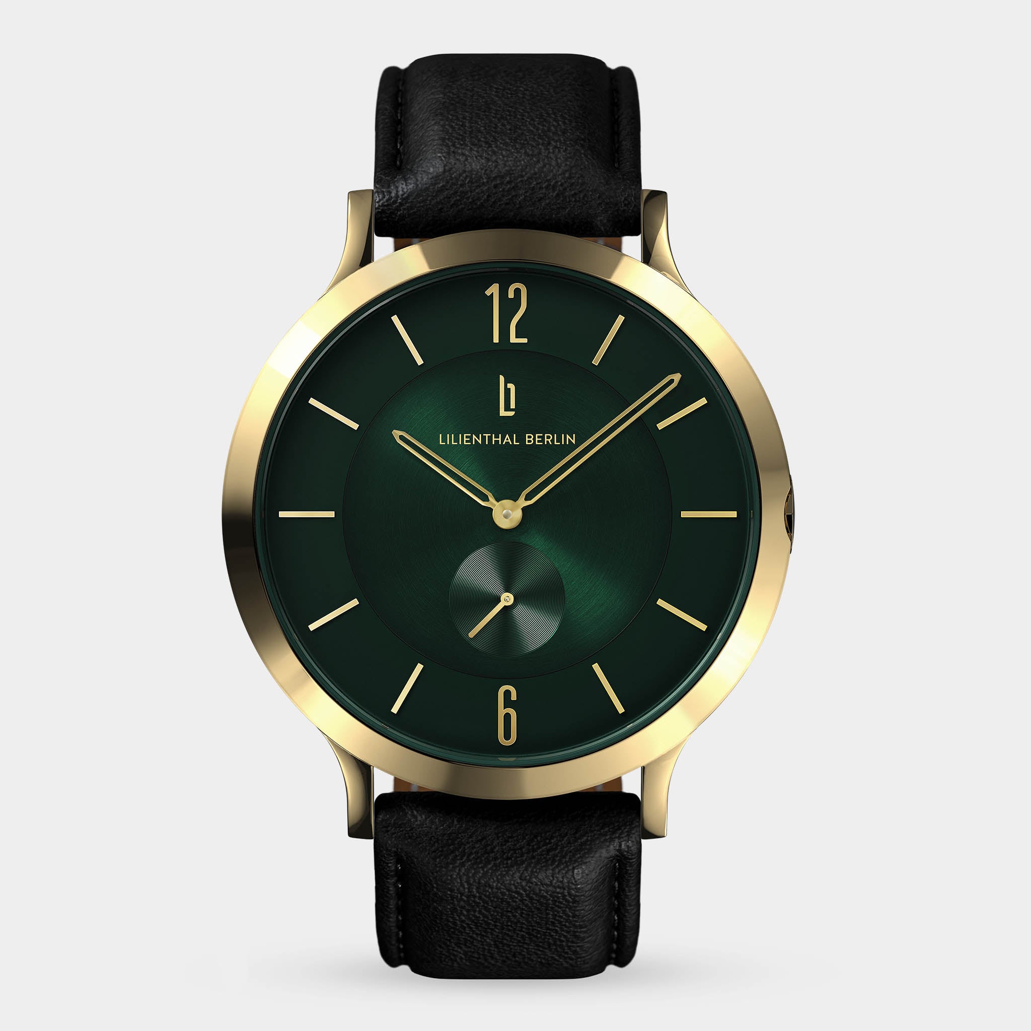 Gold case wristwatch with green dial, black leather strap, minimalist design