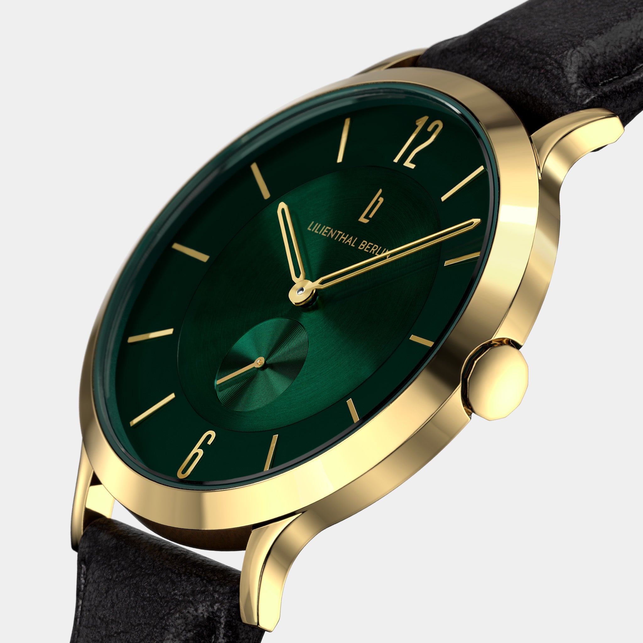 Gold wristwatch with green dial, gold markers, black leather strap, and minimalist design.