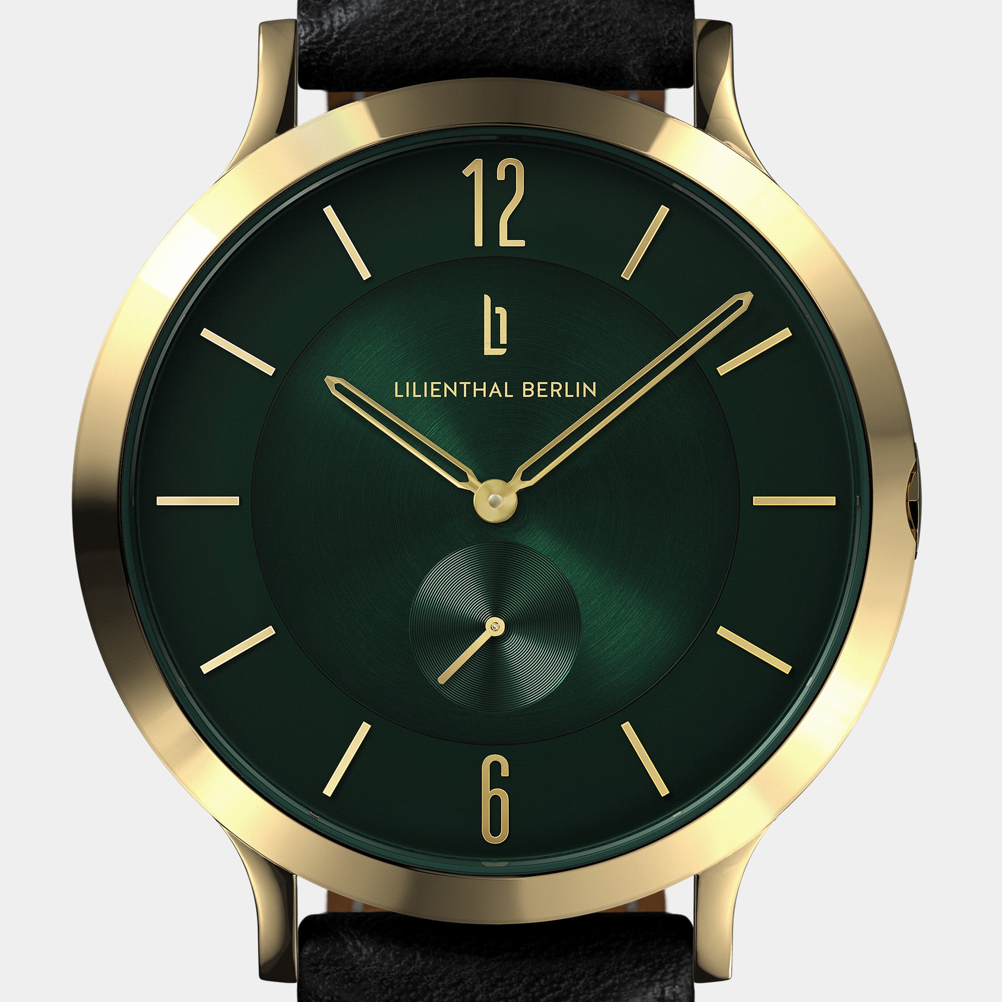 Gold and green minimalist wristwatch with black leather strap, modern dial design