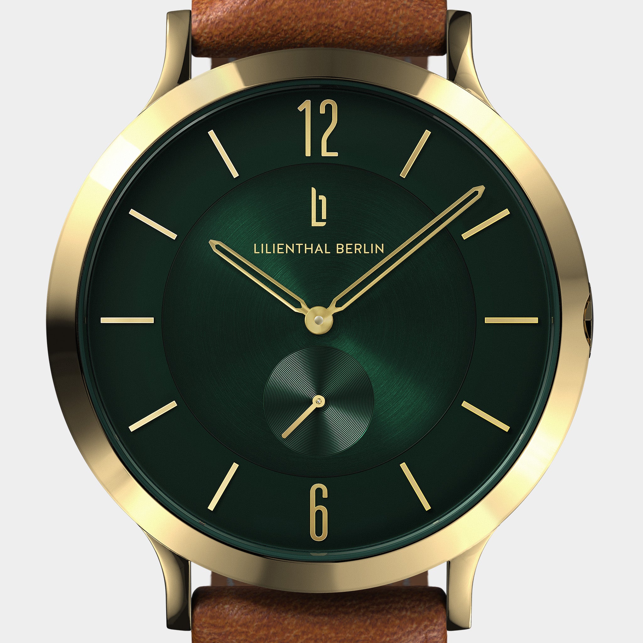 Gold and green minimalist watch with brown leather strap and Lilienthal Berlin logo