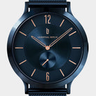 Modern black analog watch with gold hands and indices, minimalist design, close-up view.